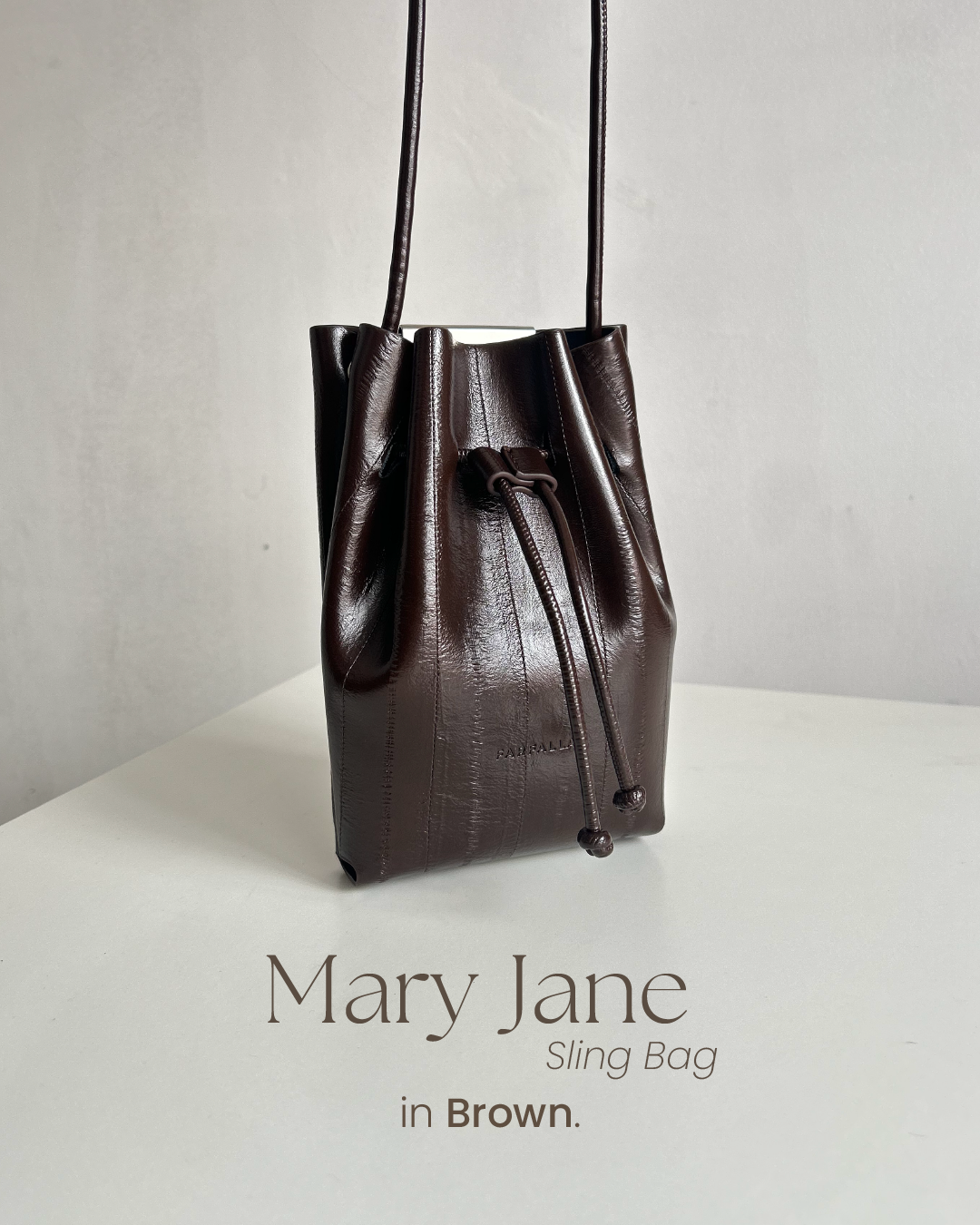 Mary Jane Sling Bag logo