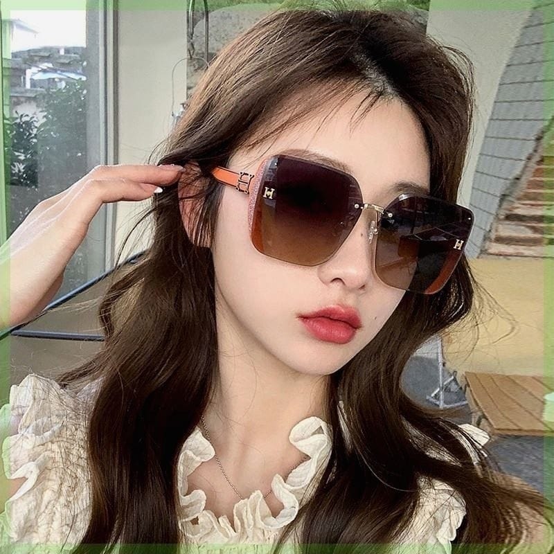 Kacamata Import logo