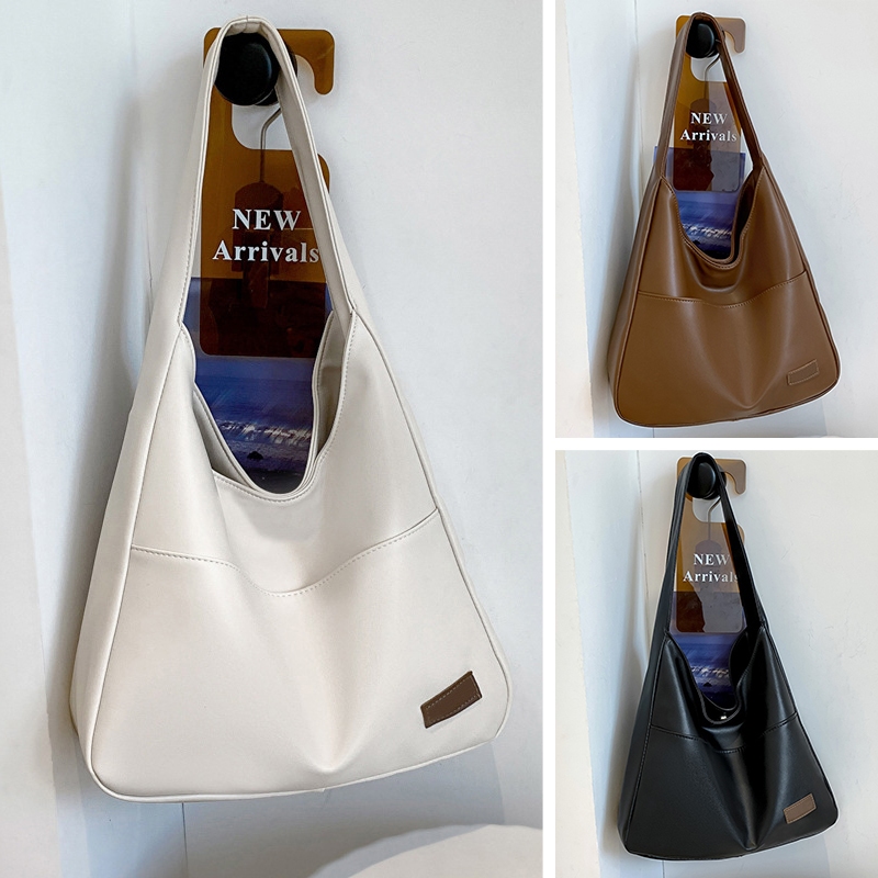 Tas Kulit Wanita Retro💰 logo