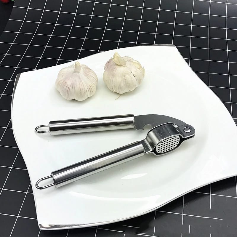 STAINLESS GARLIC PRESS GAD logo